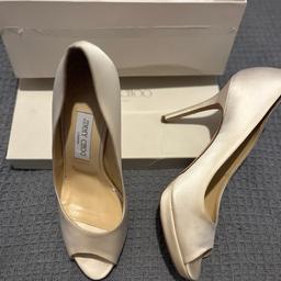 Beautiful ivory satin heels by Jimmy Choo 
Only worn/tried on indoors so very minor marks showing 
Size 6 uk