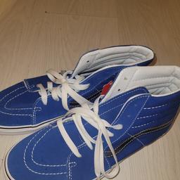 Blue and black and white vans size 5.5