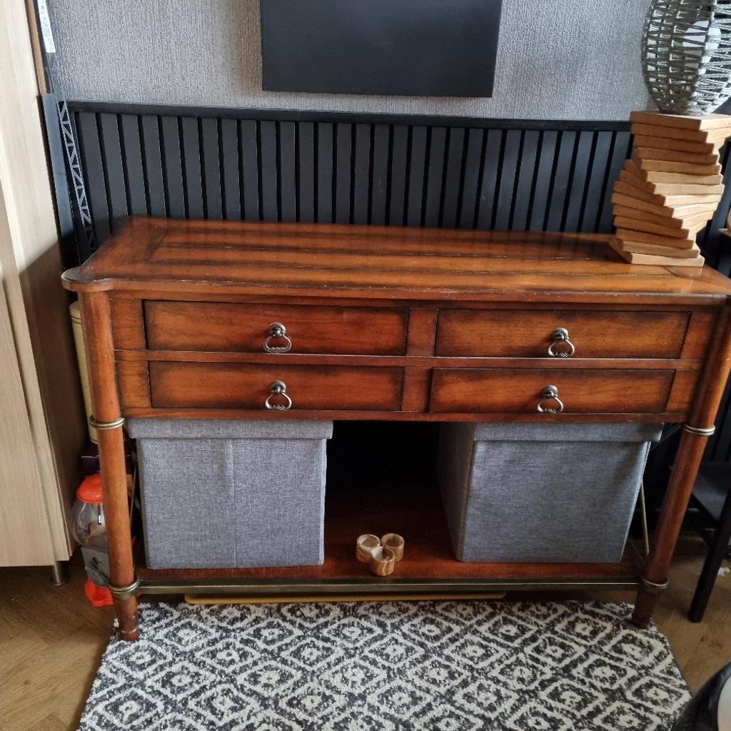 Bought originally years ago from DFS.
Rich brown/mahogany colour. Some scuffs from wear and tear. But could be beautifully restored. 4 draws and room for storage boxes/baskets underneath. It's been upstairs in bedrooms, living room and dining room. I've changed to mostly oak furniture now so it's not matching anywhere. It's just gathering dust. Collection only L34 2RD