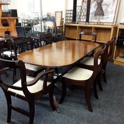 This traditional extending mahogany veneered dining table comes with four regular dining chairs plus two carvers. The whole set is in fair overall condition with marks and some scratches in places on the wood, on both the table top and chair frames.  Also the fabric seats do have marks and light stains on some of them..

Table - Fully extended - 86 inches long x 36 inches deep x 28 inches high.
Non extended - 68 inches long.
4 x chairs - 18 inches wide x 20 inches deep x 35 inches high.
2 x carvers - 23 inches wide x 20 inches deep x 35 inches high.

Our second hand furniture mill shop is LOW COST MOVES, at St Paul's trading estate, Copley Mill, off Huddersfield Road, Stalybridge SK15 3DN... Delivery available for an extra charge.

If you are interested in this or any other item, please contact me on 07734 330574, or on the shop 0161 879 9365...Many thanks, Helen. 

We are OPEN Monday to Friday from 10 am - 5 pm and Saturday 10 am - 3.30 pm... CLOSED Sundays. CLOSED Bank Holidays.