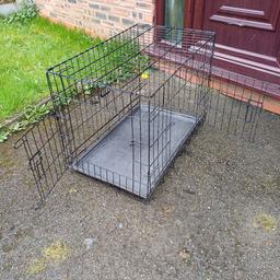 Medium size folding metal dog cage with plastic tray approx 30 inch long x 18 inch wide x 22 inch tall has 2 opening doors bargain at £20 NO OFFERS DARWEN BB3 0DU OR BOLTON BL3 2JP