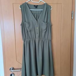 Verkaufe hier ein schönes Kleid im Blusenstil von H&M.

#blusenkleid #minikleid #kleid #khaki #gold #h&m