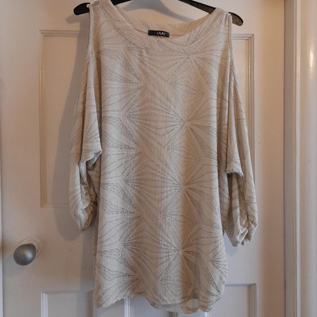 Cream cold shoulder top with silver sparkle detail.
Good cond.
fy3 layton to collect or can post for extra.
might be able to deliver for free if passing or fuel costs