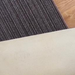 Brand new brown with grey stripe carpet mt with brown wool edging and gel backing 
Ideal for hard flooring
5x3ft (153x91cm)