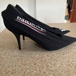 Brand new without box Authentic Balenciaga Political Campaign Pumps. Size 39 EU/6 UK. As you can see by the pictures the soles and the heels have sustained no wear at all. Original shoes bag included.