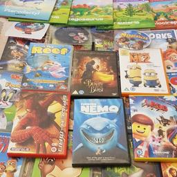 collection of 23 childrens dvds including nemo reef lego the movie bat man nemo jungle book ,also5 books on dinasours