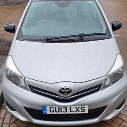This Toyota Yaris 5-door hatchback is a great option for those looking for a reliable and efficient car. With only 2 previous owners and 42,500 miles on the clock, this car has been well-maintained and comes with a partial service history. The MOT is valid until May 2025 and the car is registered with a V5C document. The exterior is a sleek silver colour, with alloy wheels adding a touch of style. The interior is black and includes features such as air conditioning, AM/FM stereo, and CD player. Powered by a 1.3ltr engine, this car runs on petrol and has an automatic transmission. It's a 2013 model and was first registered in March of that year. This Yaris is perfect for those in search of a reliable and practical car for everyday use.

Automatic with manual gear shifting and steering wheel paddles. Rear parking camera, Bluetooth and Aux, steering wheel controls.

Selling due to needing a larger car for incoming baby.