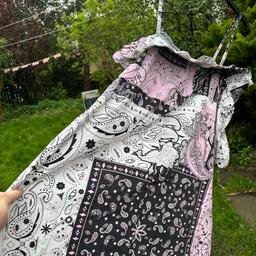 Gorgeous ASOS Summer Dress. Like new hardly worn once . Pink black and white print dress with straps and a ruffle neckline . Great summer dress. .