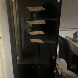 Black gloss/glass display cabinet. Good condition. Collect east bowling