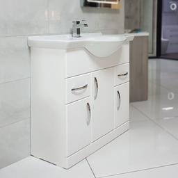 Vanity unit Cabinet with Basin sale now £339 !!

BRAND NEW !
850 mm slim vanity unit 
Multi doors and drawers
Modern high quality MDF gloss unit 
Quality Basin top 
3 doors and 2 drawers with modern chrome handles.
Basin included
Tap and waste not included

Provides big storage space for your essentials and towels. 
Ideal for giving your bathroom a fresh clean modern look.

Can deliver local for fuel cost