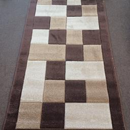 biege brown rug for sale with minor defect 80 by 150