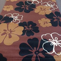 very nice floral pattern rug nice size for bedroom or a living room