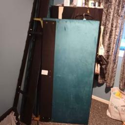 Dismantled kingsize teal slat bedframe without mattress Needs to go asap as other beds in room nothing at all wrong it !!