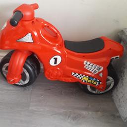 Red plastic motorbike one black handle missing but can take other one off doesn’t affect use at all pick up Norris green
