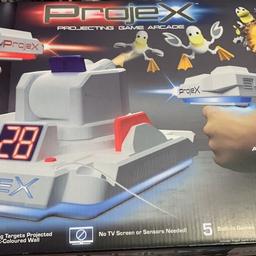Projex projector game my son got 2 for birthday and was only taken out the packet still in smyths for £50