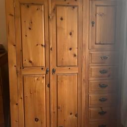 Here i have for sale a large wardrobe with small cupboard and drawers which split for easy transportation all that needs doing is the decorative trim on base and top be lifted off and removed.

see attached picture for measurements in CM

any questions feel free to ask