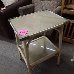 This fabulous vintage 1950's occasional table is in good general condition for its age. It has wicker or bamboo wrapped around the legs and has a gorgeous fabric underneath the glass on the top and bottom tier. It's very heavy for its size and solid.

It is 19 inches wide x 15 inches deep x 27 inches high.

Our second hand furniture mill shop is LOW COST MOVES, at St Paul's trading estate, Copley Mill, off Huddersfield Road, Stalybridge SK15 3DN...Delivery available for an extra charge.

There are some large metal gates next to St Paul's church... Go through them, bear immediate left and we are at the bottom of the slope, up from the red steps... 

If you are interested in this or any other item, please contact me on 07734 330574, or on the shop 0161 879 9365...Many thanks, Helen.

We are OPEN Monday to Friday from 10 am - 5 pm and Saturday 10 am -  3.30 pm.. CLOSED Sundays. CLOSED Bank Holiday long weekends...