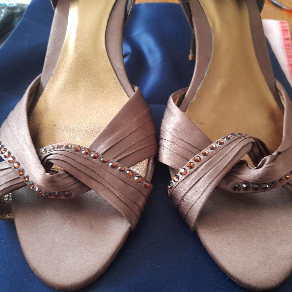 Brown suede effect 5inch shoe with wedge front with 2 strips of dusty pink and gold round front of shoe size 7 £2 Brown patient leather with diamonties on front of Cross over straps size 7 £2 buy both for £3 gcd