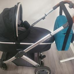 oyster 2 carrycot and older pram seat. both gave footmuff and raincovers with changing bag. few scratches on frame but over all good condition. cost just over 500 new so bargain