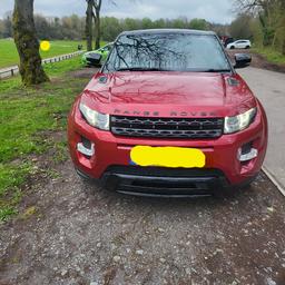range rover evoque dynamic lux 2.2 2011. part service history 9 months mot hpi clear 116000 freeview TV parking sensors heated steering wheel heated seats,heated front window self parking 360 cameras. had recall steering bolts upgrade . Also had drive shaft replaced. 4 new tyres fitted serviced 2 months ago. 2 keys. Some age related marks red bucket seats pan roof. for more info please message.