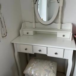 New reduced price! White dressing table. Stool & mirror included. Has 5 drawers. In new condition as it is in a spare bedroom. Collection only.