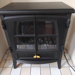 electric fireplace in excellent condition comes with remote control