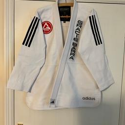Excellent condition Adidas Jiu Jitsu Gi size is A2 for top and trousers. Also comes with a nice bag