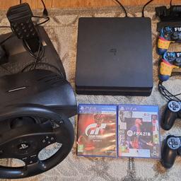 Get ready for an immersive gaming experience with this Ps4 in great condition. 2 games included with console. The steering wheel adds a realistic touch to your gaming experience. The charging dock feature allows you to conveniently charge your gaming controllers while you play, ensuring you never have to worry about running out of power. Whether you're a casual gamer or a hardcore enthusiast, our charging dock and steering wheel is the perfect addition to your gaming setup.

Cash on collection