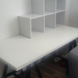 Ikea desk and storage cube from b&m.l - smaller than an IKEA one, so you won't be able to use the boxes.
Nice and sturdy but does have marks all over the desk as I used it as a craft table and hot glue rook some of the top off. I have ahown some marks in the pics.
Top park off desk lays flat on the stand, so no fixtures needed. Only selling due to house move and won't have the space as it is big.
Collection only