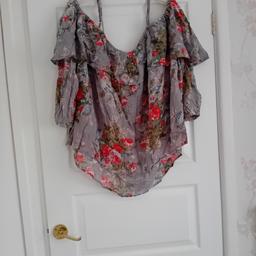 Gorgeous floral top frilled bardot neckline eith 3/4 sleeves with elasticated cuffs