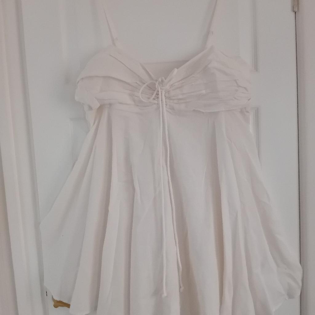 Lovely Full Skirted Sundress ruched at the back so quite versatile fit size 18 but on the smaller side as its Primark collection Halewood L26