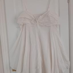 Lovely Full Skirted Sundress ruched at the back so quite versatile fit size 18 but on the smaller side as its Primark collection Halewood L26