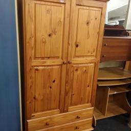 This lovely large double solid pine wardrobe with two small bottom drawers is in good all-round used condition. Some marks to the wood in places...

38 inches wide x 21 inches deep x 73 inches high.

Our second hand furniture mill shop is LOW COST MOVES, at St Paul's trading estate, Copley Mill, off Huddersfield Road, Stalybridge SK15 3DN...Delivery available for an extra charge.

There are some large metal gates next to St Paul's church... Go through them, bear immediate left and we are at the bottom of the slope, up from the red steps... 

If you are interested in this or any other item, please contact me on 07734 330574, or on the shop 0161 879 9365...Many thanks, Helen.

We are normally OPEN Monday to Friday from 10 am - 5 pm and Saturday 10 am -  3.30 pm.. CLOSED Sundays. CLOSED Bank Holiday long weekends...