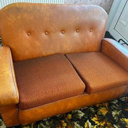 Vintage tan coloured leather sofa with 2 armchairs. Fabric cushioning. Can be sold separately or all together. Collection only from Wigston, Leicester.