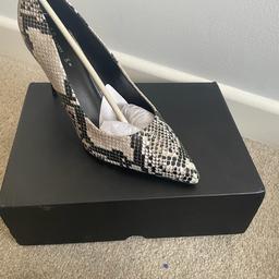 Brand new never worn snakeskin shoes in original package