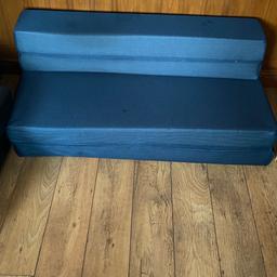 Blue double sofa bed for sale.