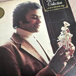 This is a Johnny Mathis vinyl and is of The Mathis Collection.

Is old and has been in storage so sleeve is slightly won but vinyl looks in good condition (can’t test as no player!)