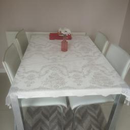 Dinning table and 4 chairs, small wear and tear,lots of life is there.only collection is preferred.