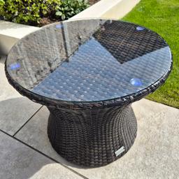 Originally purchased from Rattan Garden Furniture Ltd - Round Rattan coffee table, glass top. 58cm diameter, 60cm high.

collection only