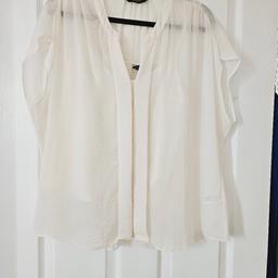 Pale cream coloured 2 in 1 top. Inside cami top with adjustable straps and outer floaty style top with concealed front button fastening, size 16.

cash and collection only, thanks.
possible delivery to Conisbrough on Saturday mornings only around 11 am.