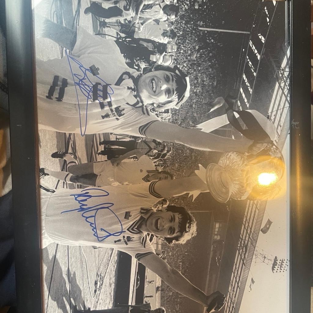 This stunning 16x12 photo captures West Ham United legends Ray Stewart and Geoff Pike in their prime, reliving their unforgettable triumph in the 1980 FA Cup Final. Hand-signed by both players, this original piece of memorabilia is a must-have for any serious football fan. Celebrate the glory days of West Ham United with this beautiful signed photo, perfect for your collection or as a unique gift for a fellow Hammers supporter.