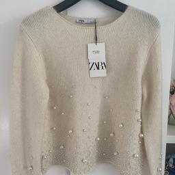 BRAND NEW 

This is a beautiful knit sweater 
With pearls very eye catching!

Size: LARGE 

RRP:£49.99