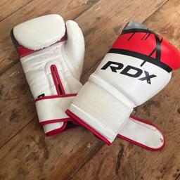 RDX- F7 Boxing gloves

Very good condition. Engineered for battle and backed with the most advanced technologies, these boxing and training gloves are untouchable in the ring. The reinforced coating and shock resistant padding makes them the ideal sparring or kickboxing gloves, made using Maya Hide leather to weather the hardest of shots from your opponent. With strategically placed perforations, these punching gloves offer maximum ventilation by wicking away sweat and keeping your hands as cool as your head. Also designed with a smart Hook-and-loop wrist strap for adjustability and unbeatable wrist support to help hone your punch technique.