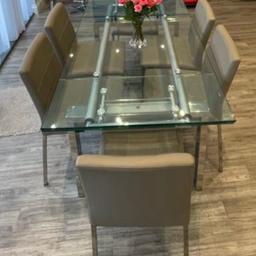 6 faux leather dinning chairs, 4 stools and extending dinning table. Dinning table fits 6 unextended and up to 10 extended. 
Collection only. Any disassembly and reassembly to be done by buyer.