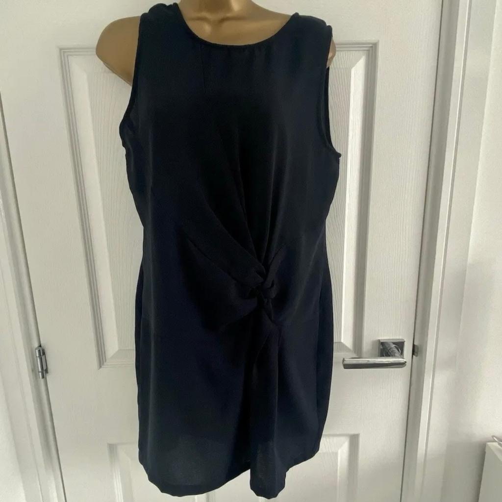 ASOS Women's Dress
Size 12
Excellent Condition
Navy Blue Colour
Round Neck
Sleeveless
Twist Drop Waist
Buttoned Keyhole Back
Concealed Back Zip
Back Split

Approx Measurements:
Front Length: 33½ inches
Armpit To Armpit: 17 inches
Waist: 34 inches
Hem: 42 inches

100% Polyester
Hand Wash

From A Smoke And Pet Free Home
Selling Due To A Massive Clear Out, Please See My Other Items As Happy To Combine Postage
All Measurements Taken With Garment Lying Flat On Floor