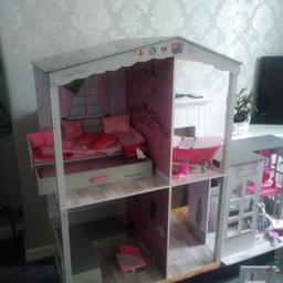 Designer friends doll house with furniture has odd signs of play nothing major all good solid wooden items includes
Dolls house
Grey Corner sofa with custions
Guest bed with bedding n pillows
Bath with built in shower
Dining table 2 chairs
Dressing table mirror with chair 

Please not the shop at side is no longer avaliable this is for sale of house with furniture 
House has been dismantled and 3 large boxers full of furniture so will require collection only please