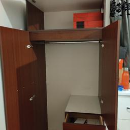 Wood Wardrobe.
Very well maintained over the years.
All doors and hinges function with no issues

Features:
Double doors
Hanger railing
Mirror
Above head storage
3x Small drawers

Collection only