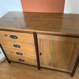 A very reluctant sale of our beautiful industrial reclaimed pinewood Next Hudson furniture. All made from a lovely stained reclaimed pine, making them solid and easy to clean.

Selling due to needing a new solution with more storage for our growing baby toys.

This sideboard unit has 4 drawers and a large cupboard with an inside shelf. Great space for storage. We have used this to keep everything we’ve needed in the living room in one place.

Inside of drawers have signs of use but they function great still. Solid drawers. Small chip on one leg, please see pictures for any marks.

Measurements: W:106cm, D:45cm, H:75cm

Collection ONLY. Cash on collection.

Check out our other listings - Open to offers for the full furniture set (TV stand, table & benches, chairs, lamp and sideboard unit).