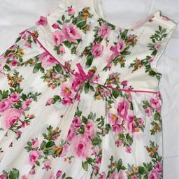 Young girls Monsoon floral summer dress in midi length. 
Size: Age 8-9 years
Great condition.