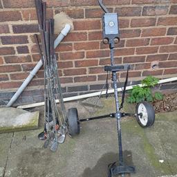 Set of golf clubs and trolley in good used condition , can deliver locally if needed